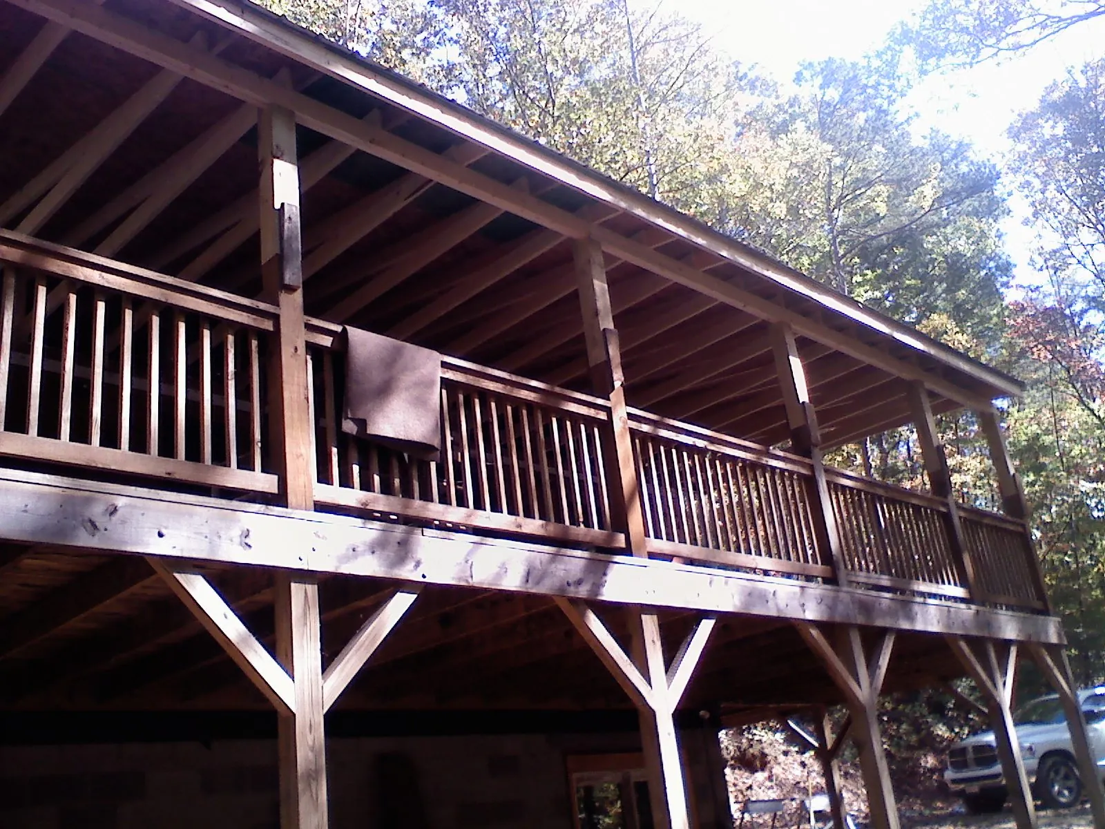 Timber framing under a new elevated porch and deck — Roof Leak Repair in Sidman by Roofing Brothers
